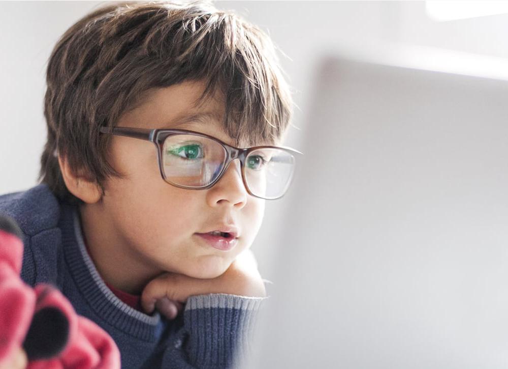 How should children wear blue-light-blocking glasses?