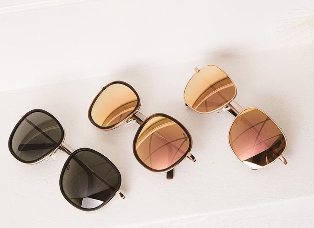 What factors influence the price of women's sunglasses?